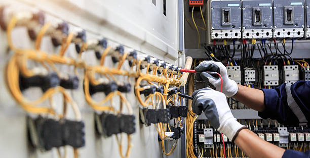 Professional Electrician technician working in Wauna, WA